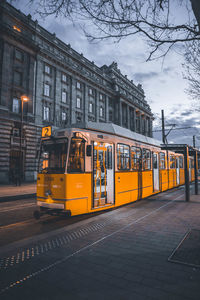 Train on street in city