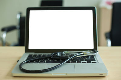 Close-up of laptop on table