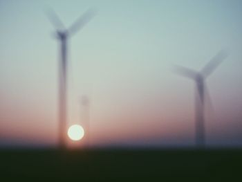 Scenic view of field against sky during sunset