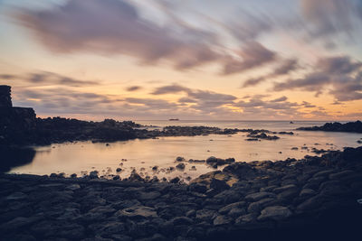 Scenic view of sea against sky during sunset