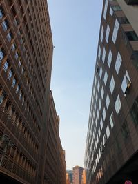 Low angle view of buildings against clear sky