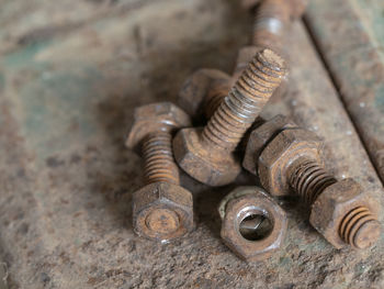 High angle view of rusty nut bolts