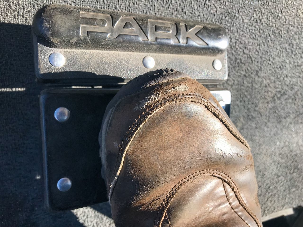 DIRECTLY ABOVE SHOT OF SHOES ON CARPET