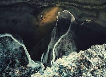 Person on rock formation