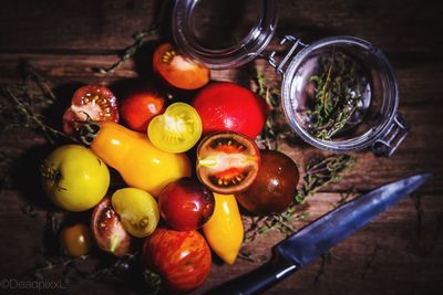 High angle view of fruits in jar on table