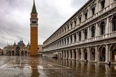 View of historical building in city during rainy season