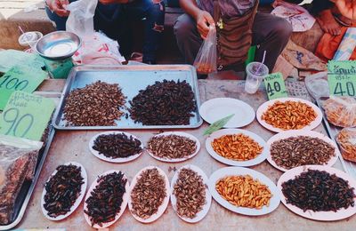 Low section of people selling food in market