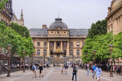 People in front of historical building