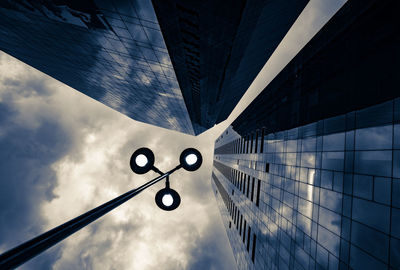 Low angle view of street light against sky