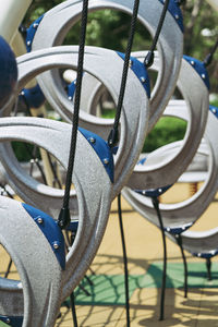 Close-up of bicycles on railing