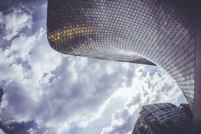 Low angle view of modern building against sky