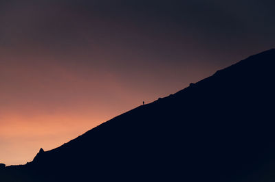 Scenic view of mountains against sky during sunset