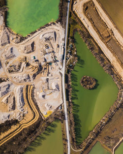 Aerial view of road by lake