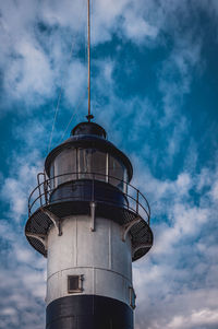 Low angle view of water tower against sky