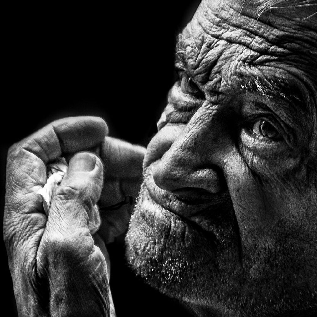 close-up, black background, studio shot, men, lifestyles, part of, focus on foreground, headshot, mid adult men, front view, young men, human face, indoors, wrinkled, copy space, mid adult