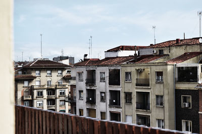 Buildings in city against sky