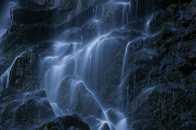 Full frame shot of waterfall in forest