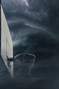 Low angle view of basketball hoop against sky