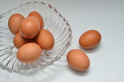 High angle view of eggs in container on table