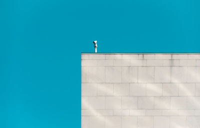 Low angle view of building against blue sky