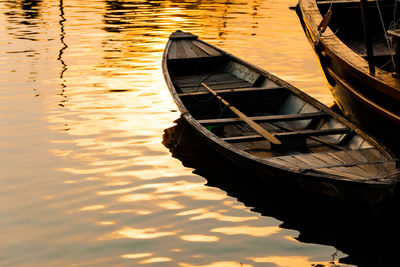 High angle view of rowboats moored in lake