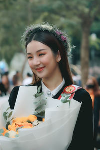 Portrait of smiling young woman