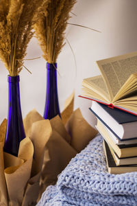 Close-up of books on table at home