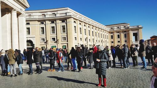 Group of people in front of building