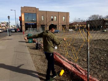 Full length of man walking against built structure