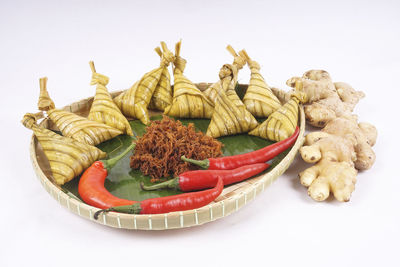 Close-up of fresh vegetables against white background