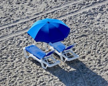 High angle view of umbrella on beach