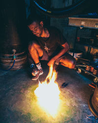 Portrait of man working on fire