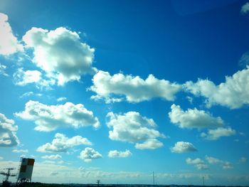 Scenic view of landscape against blue sky