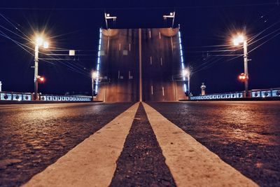 Surface level of illuminated street lights at night