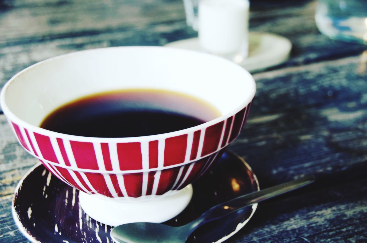 drink, food and drink, coffee cup, refreshment, freshness, saucer, coffee - drink, table, still life, indoors, coffee, cup, close-up, spoon, frothy drink, focus on foreground, high angle view, beverage, tea cup, tea