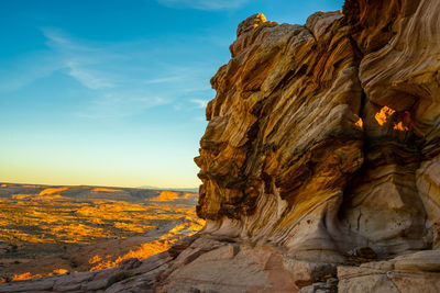 Rock formations on mountain against sky