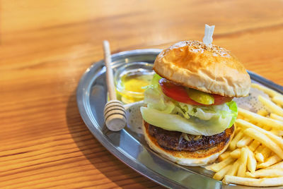 Close-up of burger in plate on table