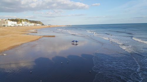 Scenic view of beach against sky