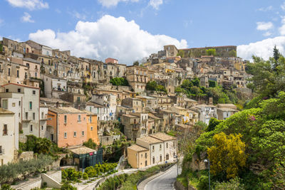 Buildings in town against sky, ragusa ibla