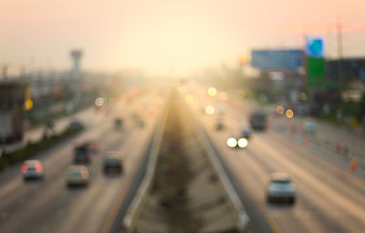 High angle view of traffic on road at sunset