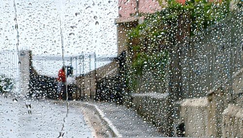 Wet glass window in rainy season