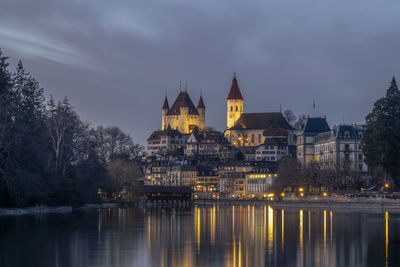 Switzerland, bern canton, thun, lake with thun castle in background