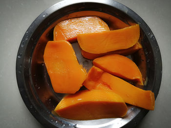 High angle view of orange slices in bowl