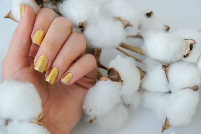 Close-up of hand holding ice cream