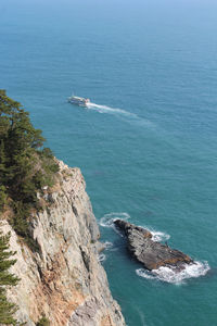 High angle view of boats sailing in sea against sky