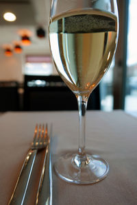 Wineglass on table at restaurant