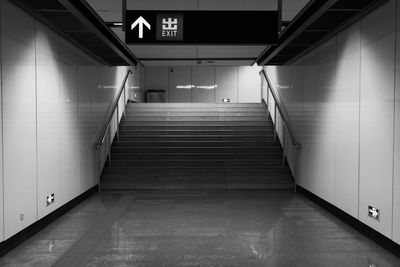 Illuminated walkway at subway station