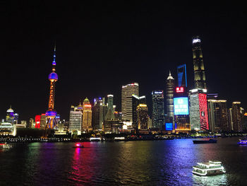 Illuminated city at night