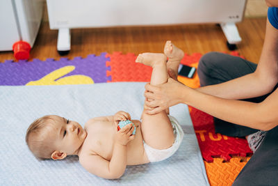 High angle view of siblings playing at home