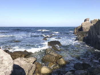 Scenic view of sea against clear sky